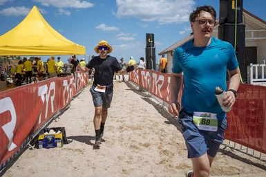 Me (blue) starting the 6 km run. Not loving it.